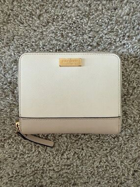 kate spade Two-Tone Cream and Beige Zip Around Wallet with Gold Plaque